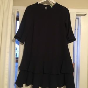 Maternity dress with fluted sleeve and ruffle hem